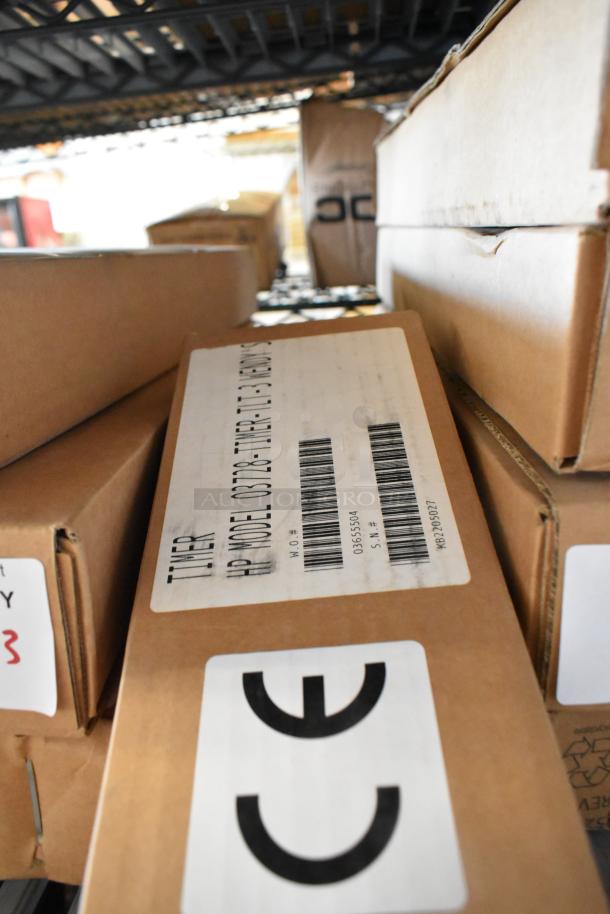 Brand new HP 03728-TIMER-TLT-3 Three Lane Timer in box, label with model number and CE marking visible.