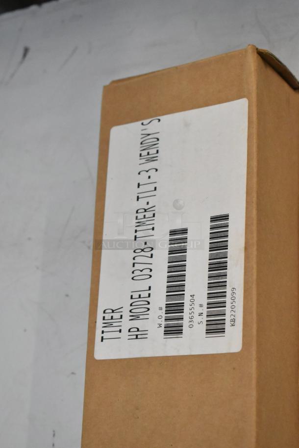 Box labeled "HP Model 03728-TIMER-TLT-3 Wendy's," containing a new HP three lane timer.