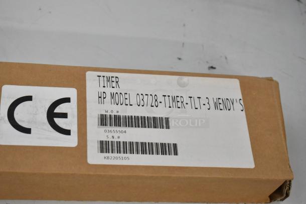 Box of 4 brand new HP 03728-TIMER-TLT-3 three lane timers, includes CE mark, model, and serial numbers visible.