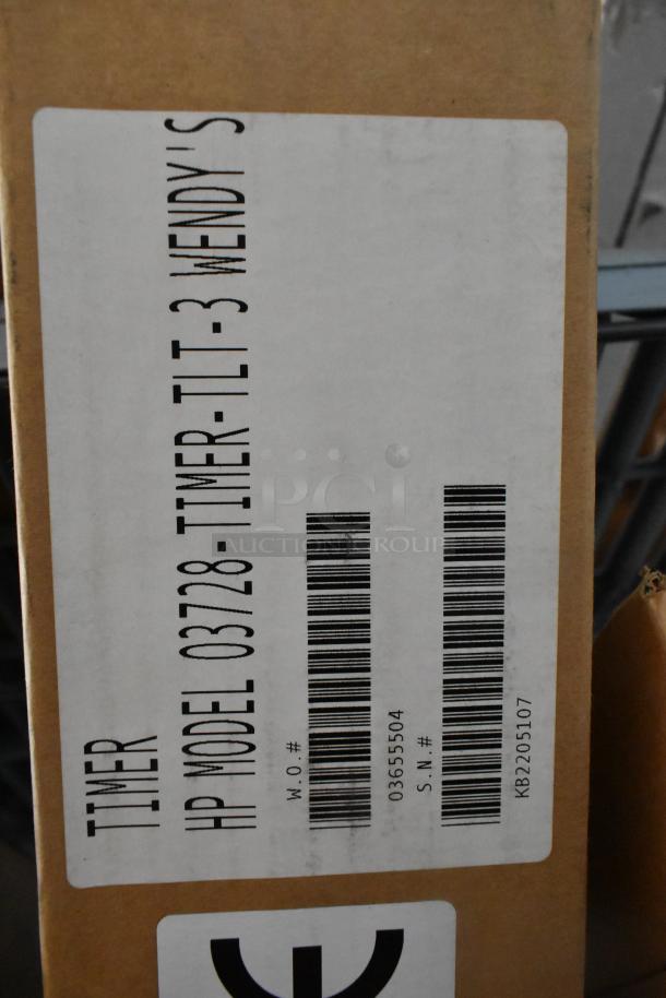 Box with 4 new HP 03728-TIMER-TLT-3 Three Lane Timers. Label shows model and serial numbers.