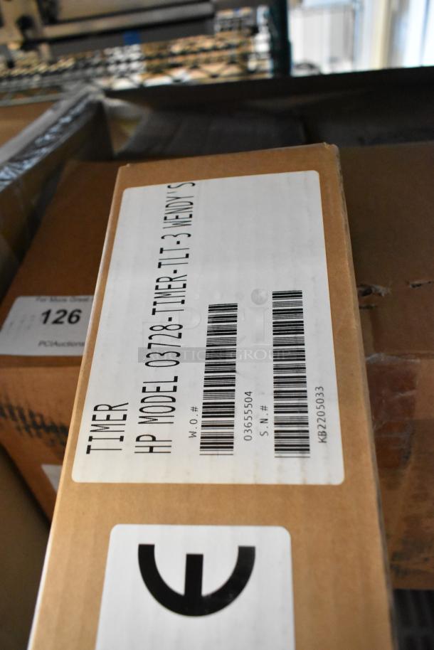 Four brand new HP 03728-TLT-3 Three Lane Timers in original boxes, marked for Wendy's, with model details visible.