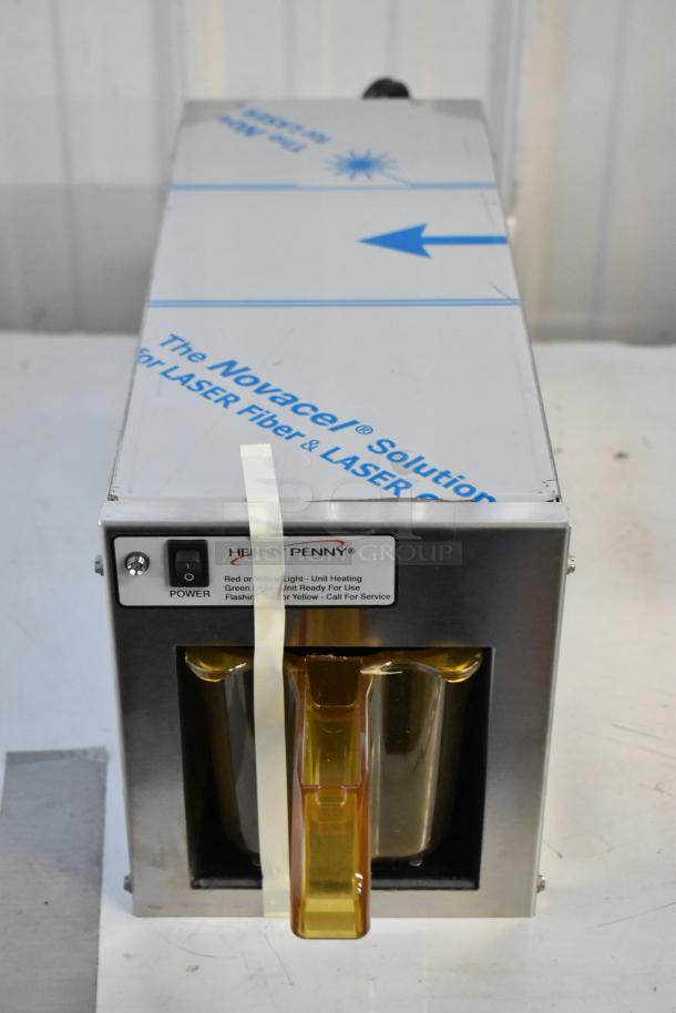Brand new Henny Penny MPC-1L stainless steel holding bin, 110V, 1 phase, in original box, with power indicator labels.