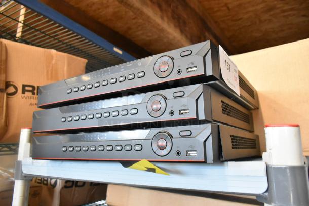 Three NVR502A Network Video Receivers, 100-240V, 1 Phase. Stack of units on a shelf. Labels indicate "3 Times Your Bid."