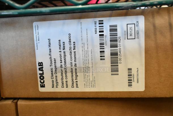 6 new Ecolab Nexa Classic Touch-Free Hand Hygiene Dispensers in box. Item label with barcode and model info visible.