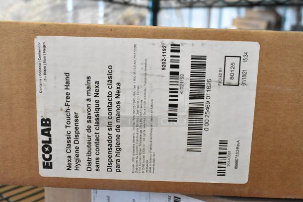 6 new Ecolab Nexa Classic Touch-Free Hand Hygiene Dispensers in boxes. Label shows model and black color details.