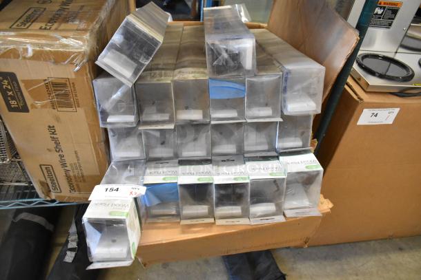 20 new Stratford Wood Racks, boxed and stacked, labeled for auction, enhancing storage and closet organization.