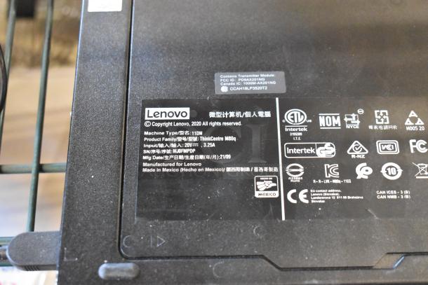 Lenovo ThinkCentre 11DN desktop, detail view of back label, including model type and manufacturing info.