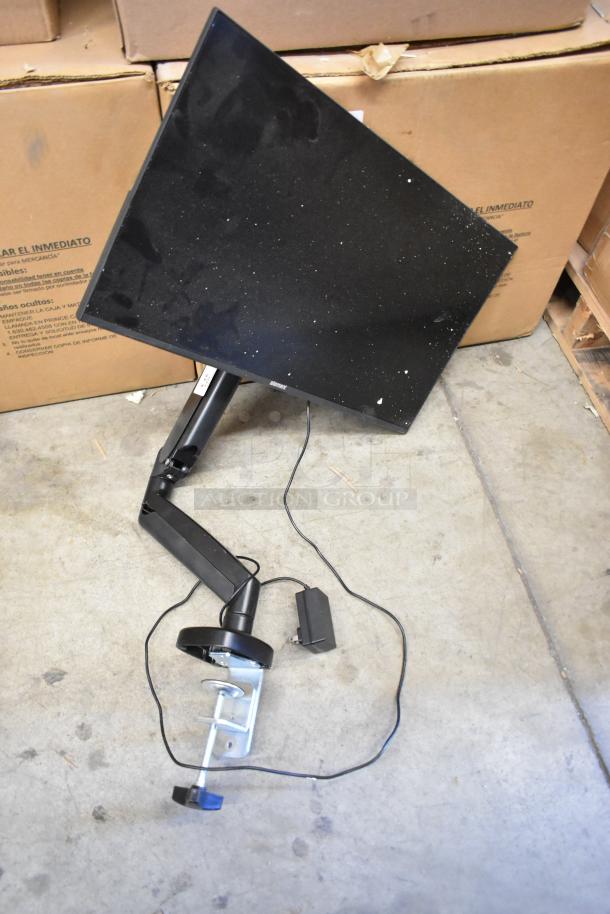 Lot featuring Element EM2FPAB24B monitor with stand, visible cable, and minor wear, part of an office electronics bundle.