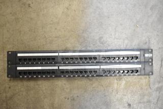 Tripp Lite 48 Port Panel in good condition, featuring numbered ports 1 to 48, black finish, and Tripp Lite branding.