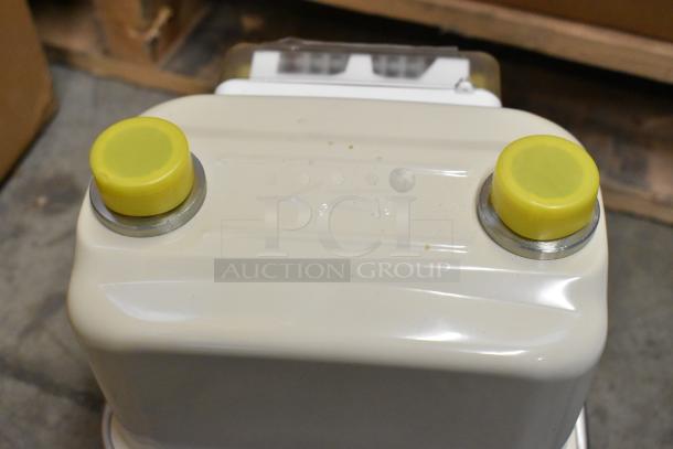 Brand new EKM Metering EKM-PGM.75 electric meter, unopened box, features yellow protective caps.