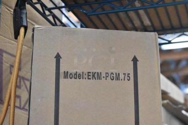 Brand new EKM Metering EKM-PGM.75 electric meter in box. Model and arrow printed on cardboard.