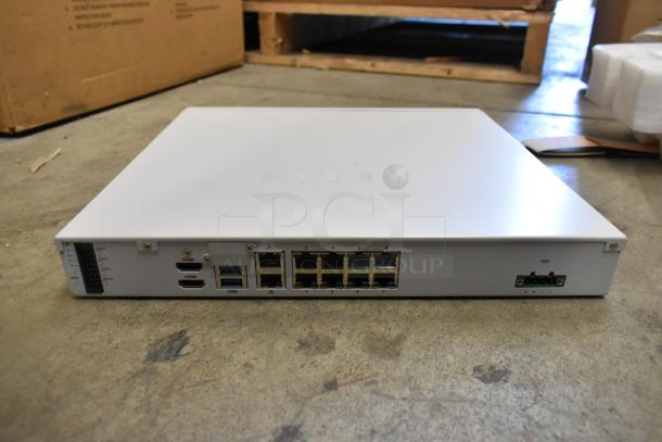 New Avigilon VA1908D HD Video Appliance in box; features multiple HDMI, USB, and Ethernet ports.