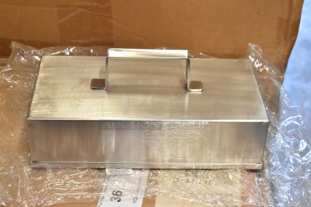 Brand new Don 1177876 metal basting cover, rectangular shape, stainless steel finish, handle on top, pristine condition. Box included.