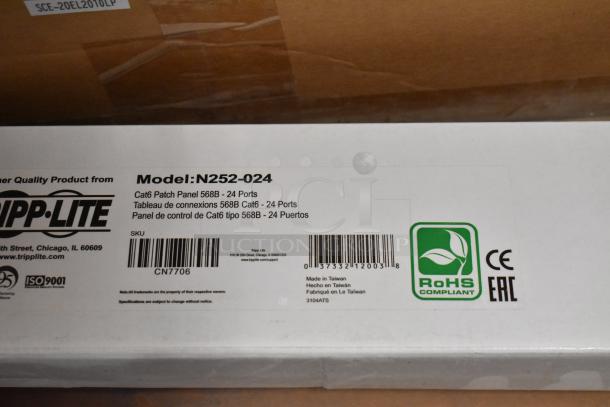 3 Tripp Lite N252-024 Cat6 Patch Panels, 24 Ports each, new in box. RoHS compliant, barcode visible.