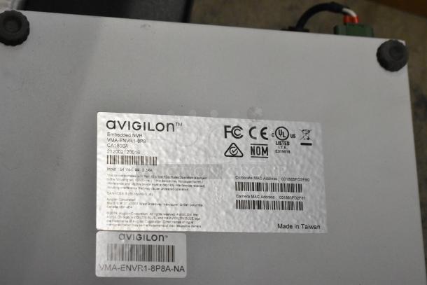 Avigilon VMA-ENVR1-8P8 Embedded NVR, model CA1808A, new condition, labeled with FCC, CE, UL certifications, and MAC addresses.