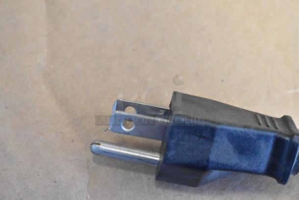 Close-up of a power plug for a Henny Penny MPC-1L commercial holding bin, 110V, black casing, unused condition.
