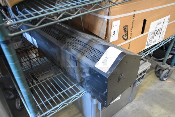 Mars LPV236-1UA-OB air curtain, low profile, 115 volts, 1 phase. Mounted on a metal shelf, label "167" attached.