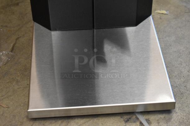 Brand new Curtis SCCAFE0AP10A000 stainless steel airpot coffee brewer base, showing sleek finish and sturdy construction.