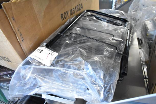 Brand new black metal mesh rack in original packaging. Includes visible auction tag number 170.