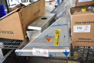 Brand new metal wall mount shelf and box, labeled lot 171 and 172, includes QR and inspection stickers.