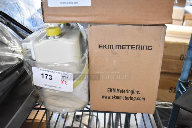 2 new EKM Metering EKM-PGM.75 electric meters in box. Auction label indicates quantity 2.
