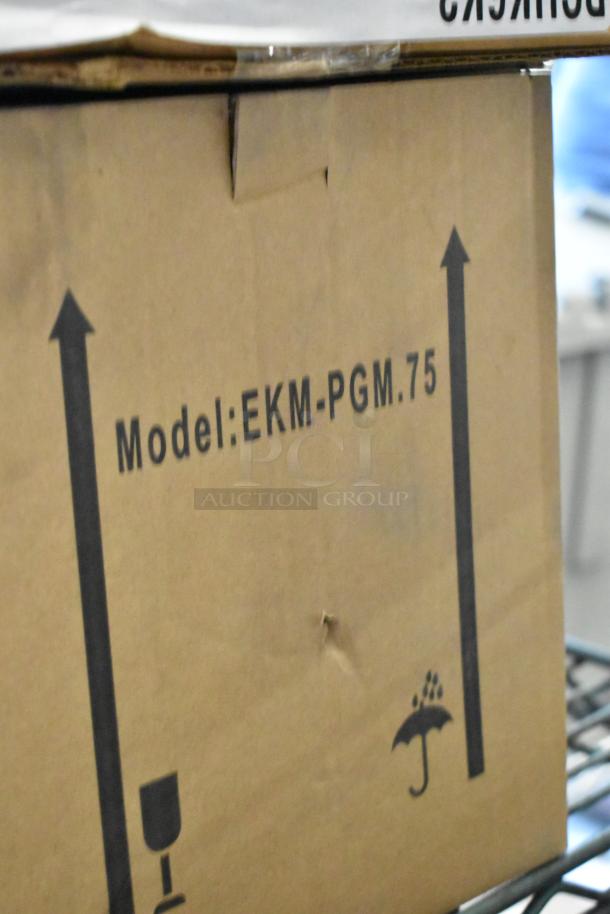 Brand new EKM Metering EKM-PGM.75 electric meter in box. Model markings visible on packaging.