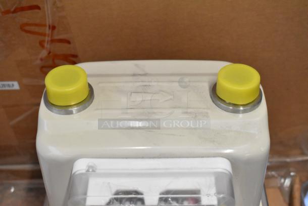 Brand new EKM Metering EKM-PGM.75 electric meter, boxed. Features durable casing with yellow caps, ready for installation.
