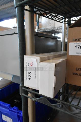 Two brand new Tripp Lite N252-024 Cat6 24-port patch panels in boxes, labeled "QTY x2" on shelf.