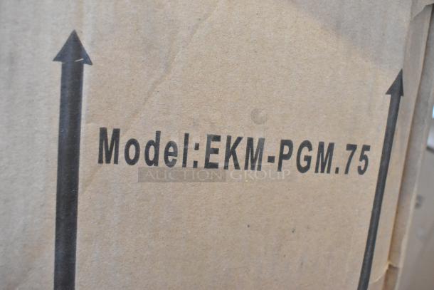4 new EKM Metering EKM-PGM.75 electric meters in box. Model number prominently displayed on the packaging.