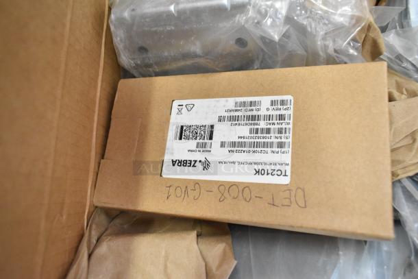 Brand new Cradlepoint AER2200 Series Router in unopened box, showing label with serial and part numbers, indicating new condition.