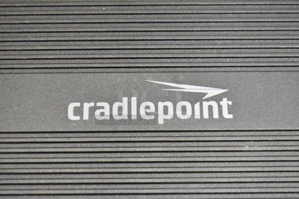 Cradlepoint AER2200 Series Router, brand new, ribbed design, logo visible. Includes Avigilon Embedded NVR.