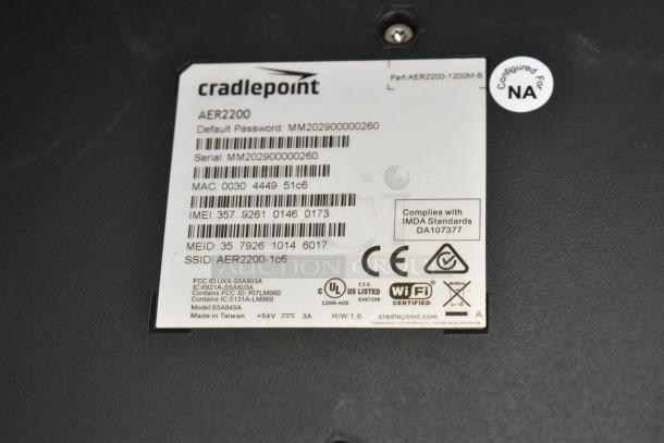 Cradlepoint AER2200 router label with model, serial number, MAC, and IMEI details, showing WiFi certification.