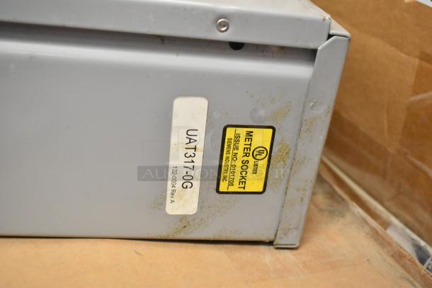 Talon Meter Socket with visible UL label and product code UAT317-0G. Slight wear evident on surface.