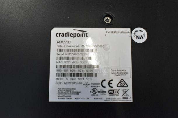 Cradlepoint AER2200 router label showing model, MAC, IMEI, serial numbers, and compliance marks. Configured for NA.