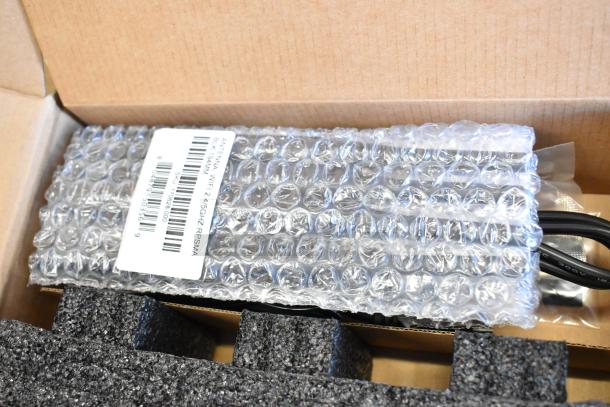Brand new Cradlepoint AER Series Router in box, wrapped in bubble wrap. Visible label: "ANTENNA WIFI 2.4/5GHZ RPSMA".