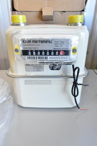 Brand new EKM Metering EKM-PGM.75 electric meter in box, model info and serial number visible, pristine condition.
