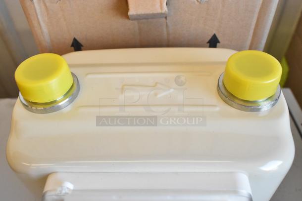 Brand new EKM Metering EKM-PGM.75 electric meter in box. Features include sturdy casing, yellow caps, and directional arrow.