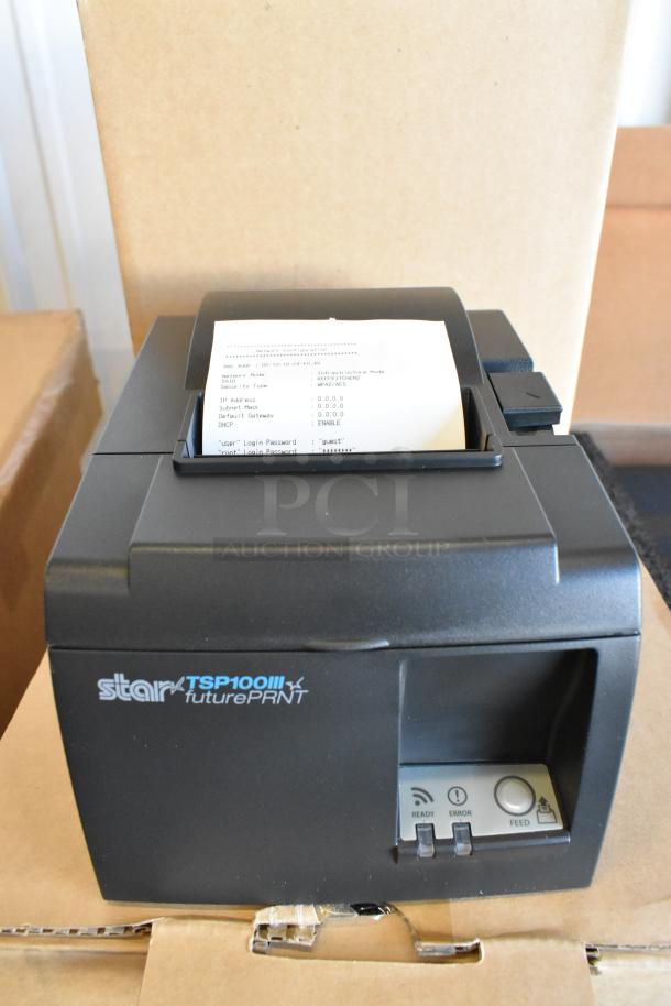 Brand new Star TSP100III receipt printer, model shown with built-in futurePRNT features, unboxed on top.