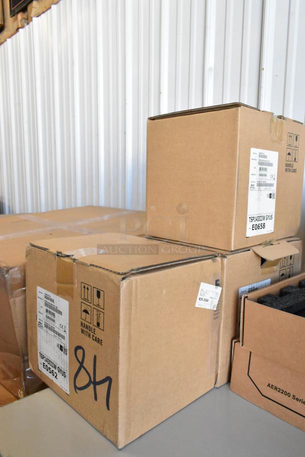 Five sealed boxes including a Star TSP100III Receipt Printer and Cradlepoint Router. Labels display model numbers.