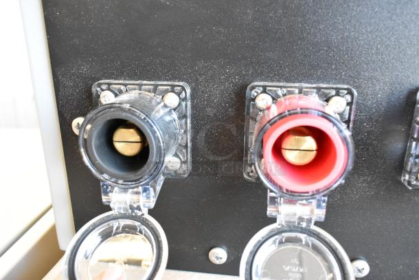 New Power Assemblies gray metal box with black and red connectors, protective covers, and pristine condition.