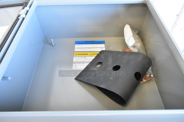 BRAND NEW Power Assemblies gray metal box, includes hardware and instructions; features warning labels inside.