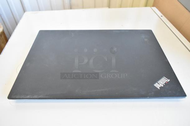 11 assorted Lenovo ThinkPad, Dell, HP laptops in various conditions; bulk auction, some signs of wear.