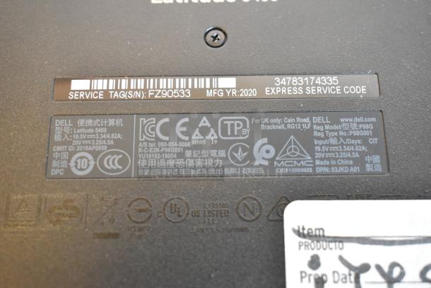 Label on the back of a Dell Latitude 5400 laptop, showing service tag FZ90533, manufactured in 2020.