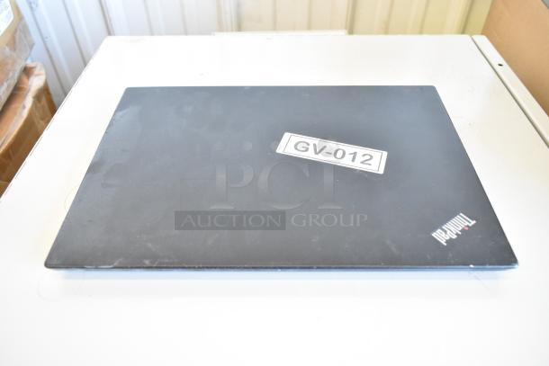 Lenovo ThinkPad laptop with visible wear, marked GV-012 on the lid. Part of an 11-laptop auction bundle.