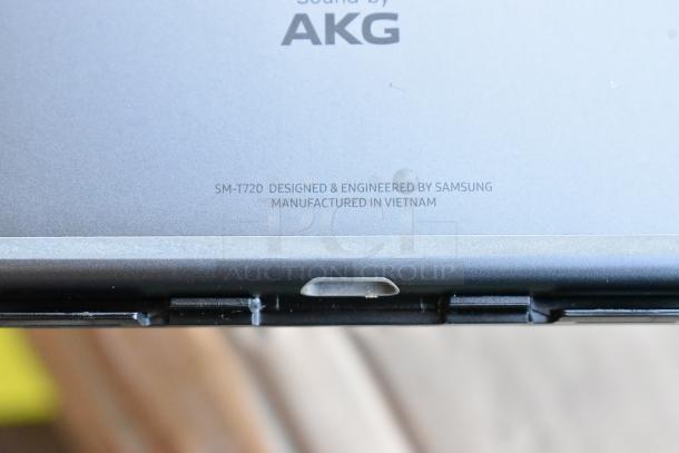 Close-up of AKG branded SM-T720 tablet, designed by Samsung, manufactured in Vietnam.