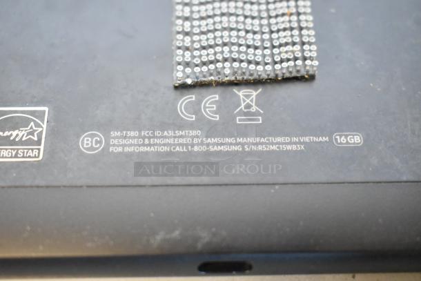 Samsung SM-T380 tablet back, featuring 16GB label and Energy Star logo. Serial number R52MC15WB3X visible.