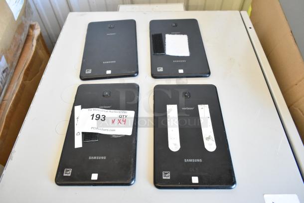 Four Samsung tablets in varying condition, branded with Verizon, featuring different adhesive patches and label with "Quantity 4".