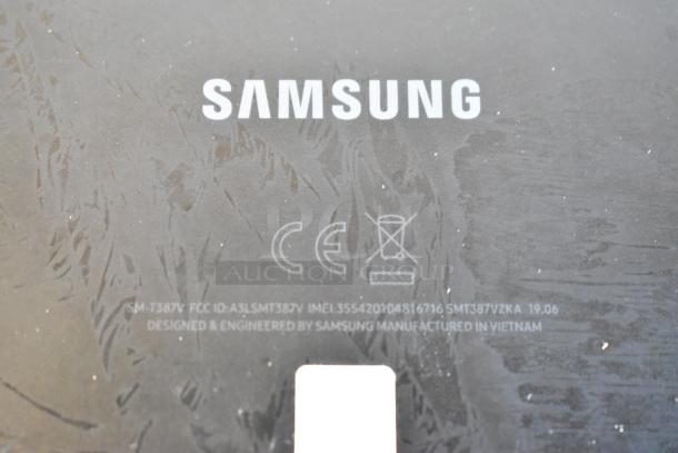 Close-up of a Samsung tablet back cover showing the logo, model SM-T387V, and manufacturing details in Vietnam.