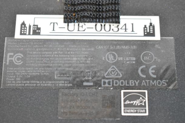 Close-up of a Lenovo tablet label showing model TB-8504F, with details about input, manufacturing, and certifications.