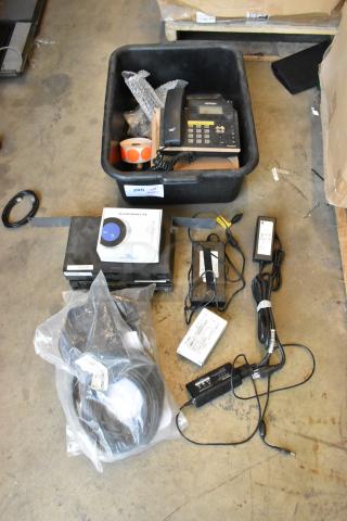 Lot of items including a Verizon corded telephone, gas detector, and wires. Mixed condition with visible labels and packaging.